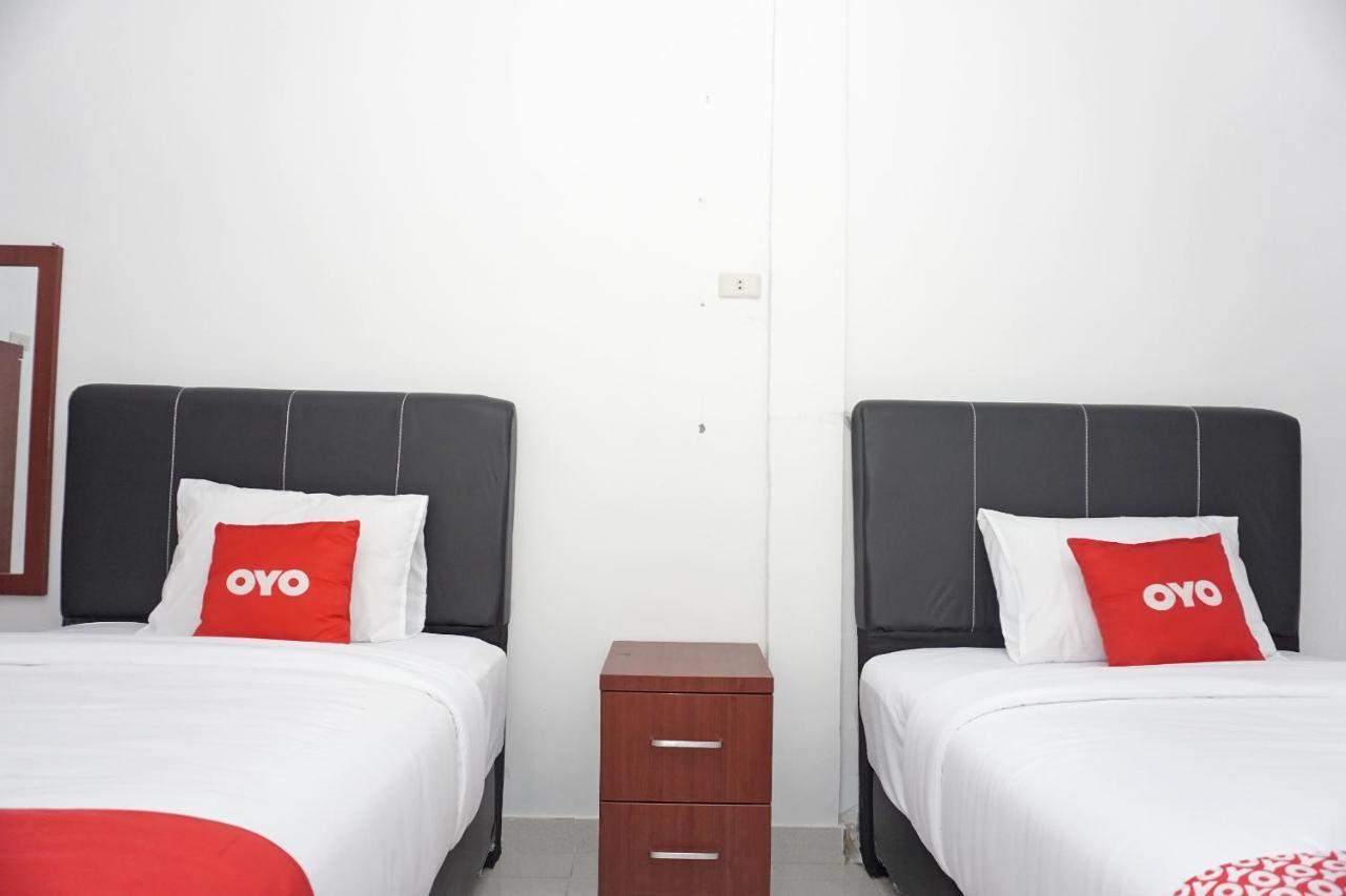 Oyo 2635 Ramos Inn Sinapuran Exterior foto